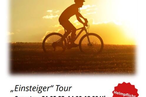 Siloette eines Radfahrers auf einem Mountainbike vor hellem Hintergrund, mit Informationen zum kostenlosen Kurs.
