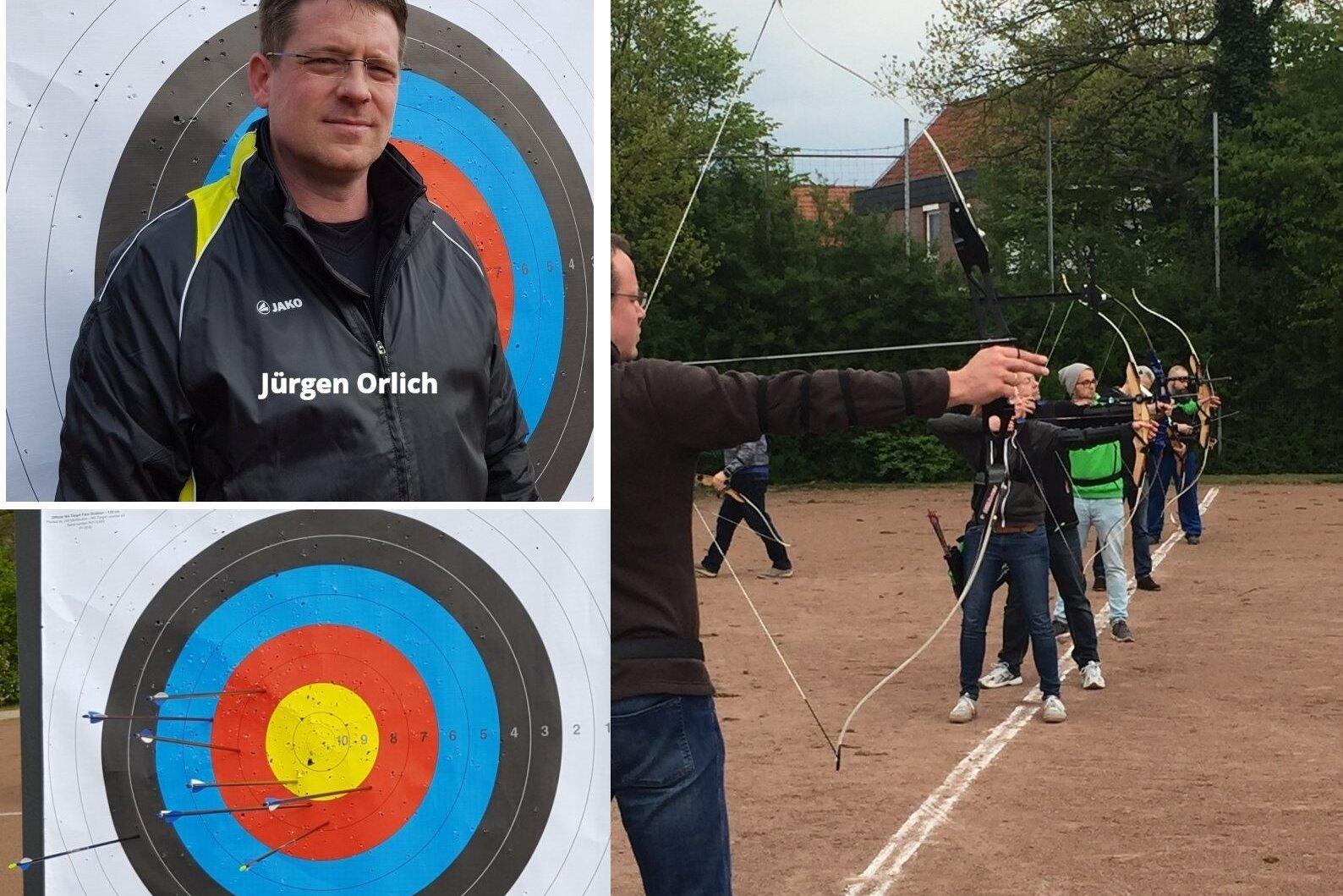 Ein Mann steht vor einer Zielscheibe, während eine Gruppe von Schützen im Hintergrund mit Bögen zielt und schießt.